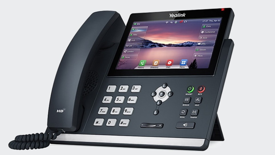 A Yealink touchscreen desk handset